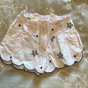 The sweetest pink shorts with scalloped bottoms